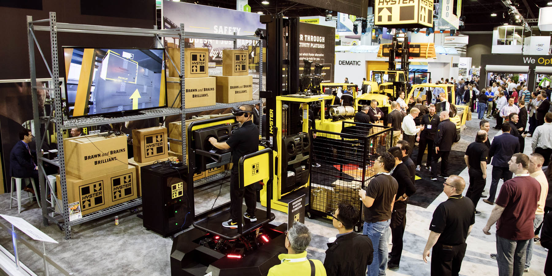 Panoramic view of Hyster exhibit with fork lifts