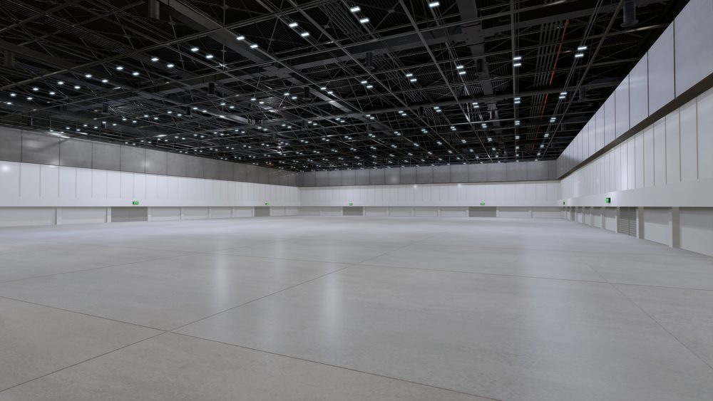 An empty trade show floor at a convention center